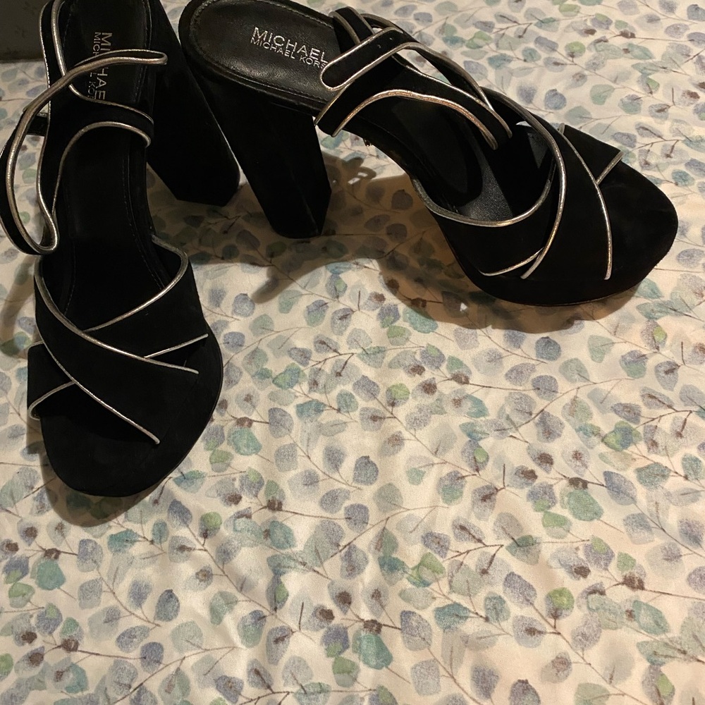 Barely used size 8 Michael kors platforms black with silver trim